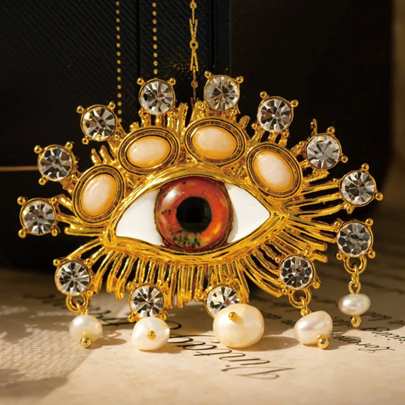 Gold and Pearls Eye Brooch