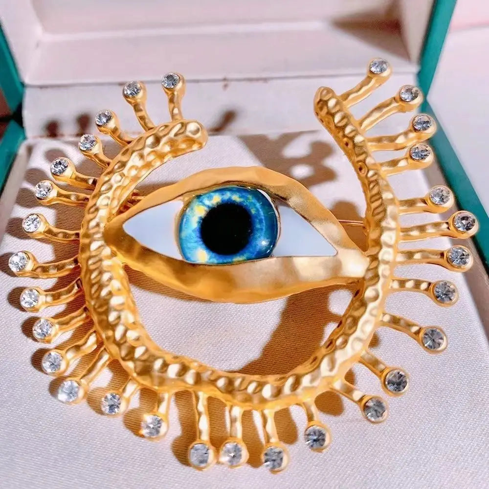 Big Blue Eye Gold Brooch