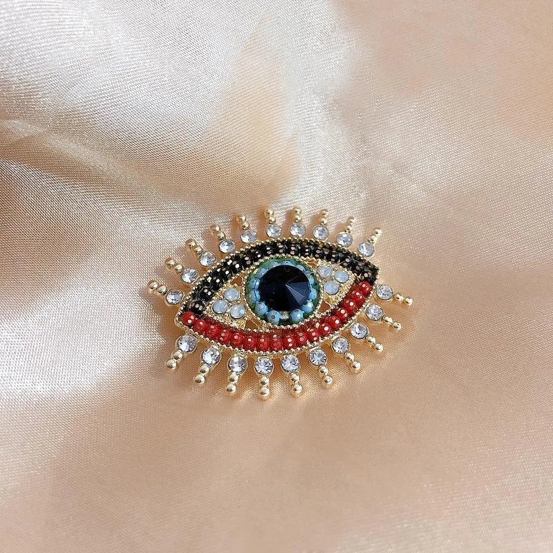 Big Blue Eye Gold Brooch