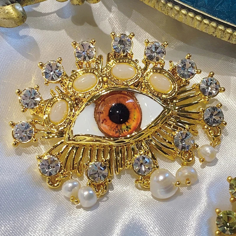 Gold and Pearls Eye Brooch